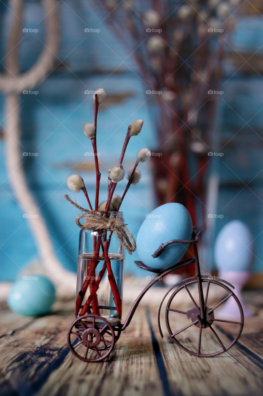 willow branches in a vase and Easter eggs 