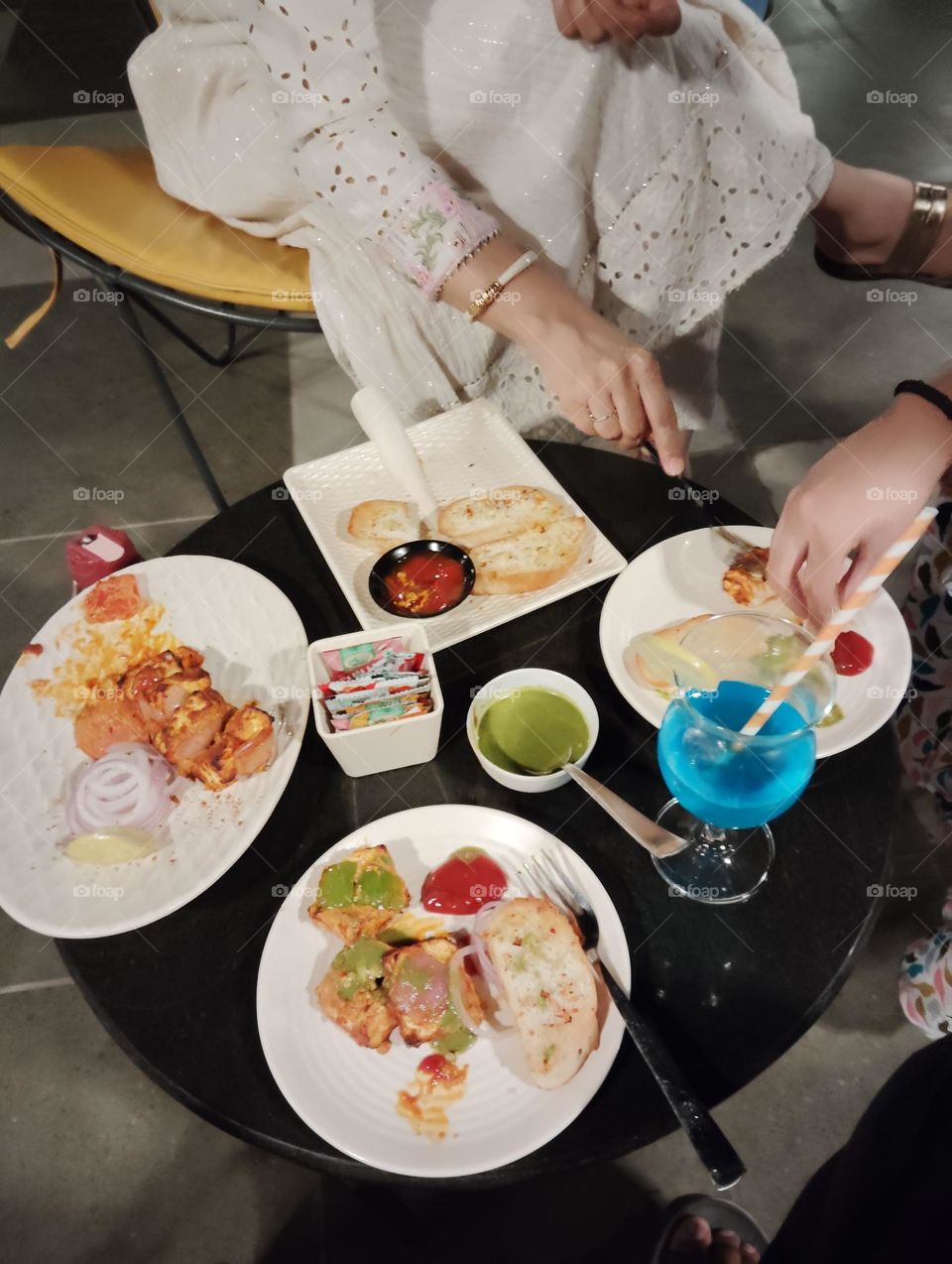 a refreshment at evening time in a hotel, paneer tikka masala soft drink spicy bread, very tasty