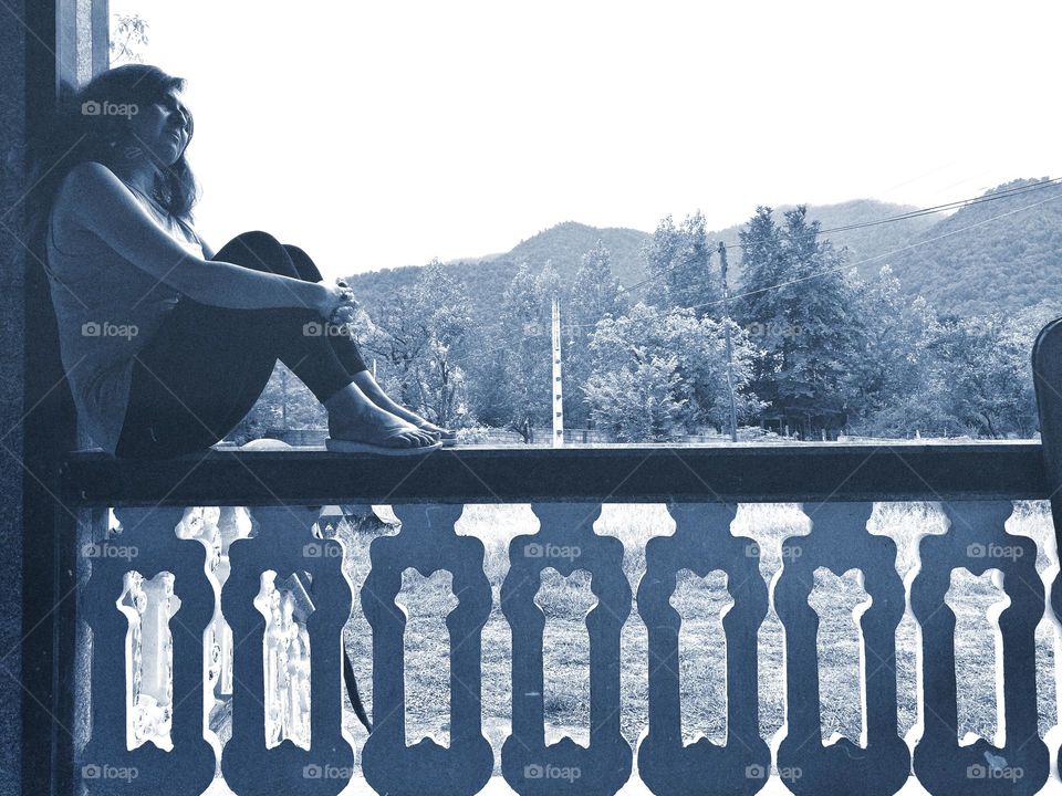 Sitting in front of you