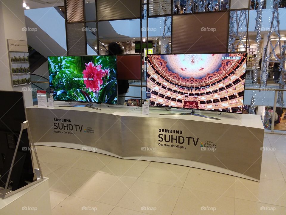 Samsung QLED televisions 4K UHD TV displayed on plinths at Peter Jones
