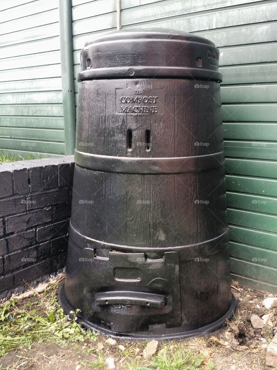 compost bin painted black