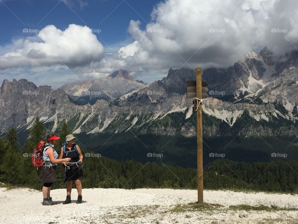 Two hiker lokking for the better way for their trekking day in Alaska mountain