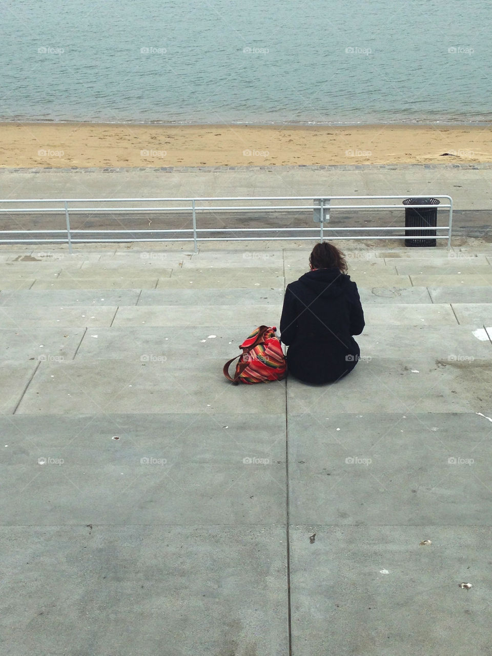 GIRL SITTING ON BENCH