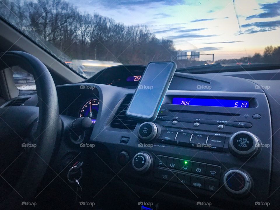 Driving with music from phone sunset road trip dash display