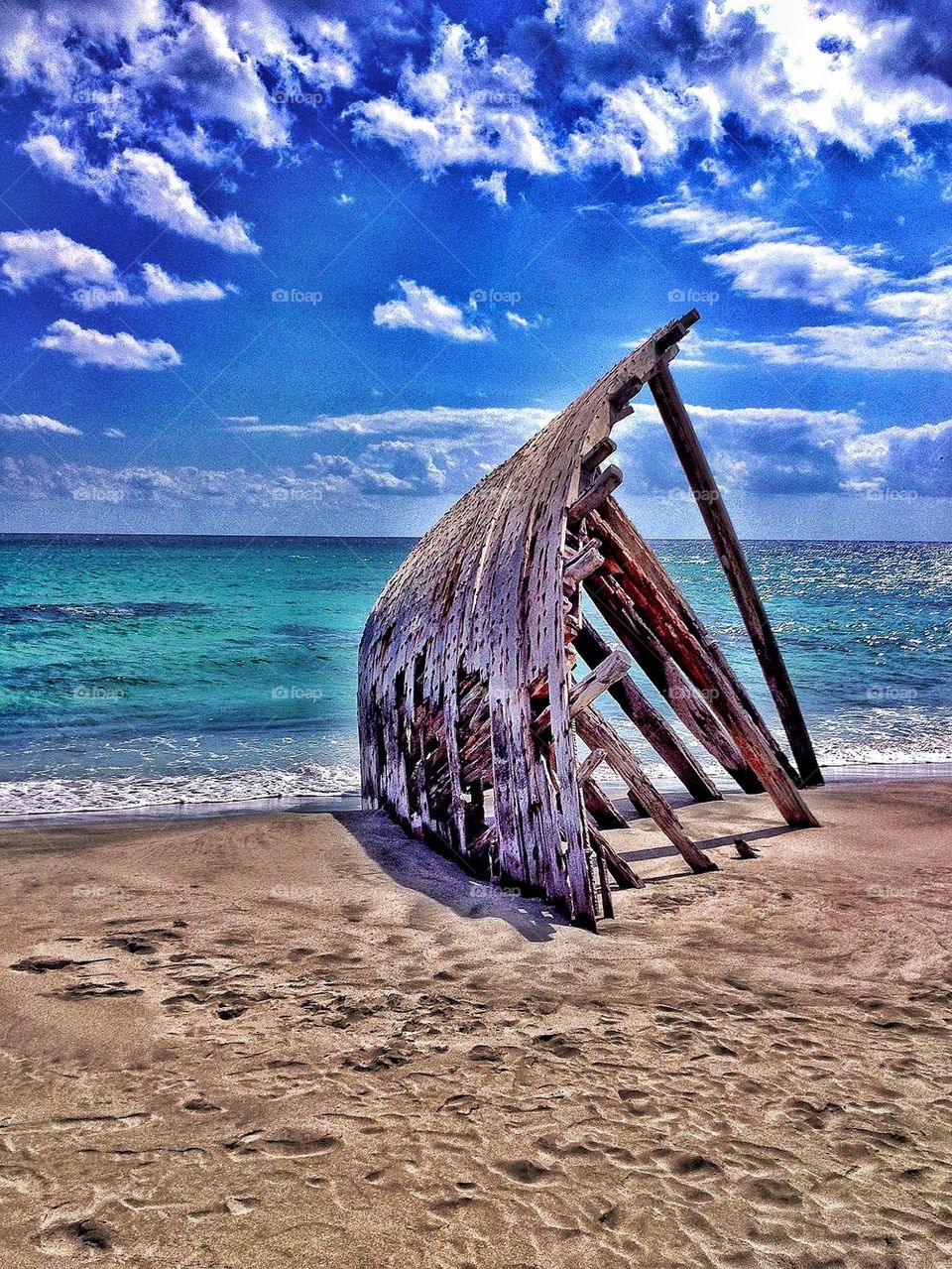 Ship wreck on empty beach