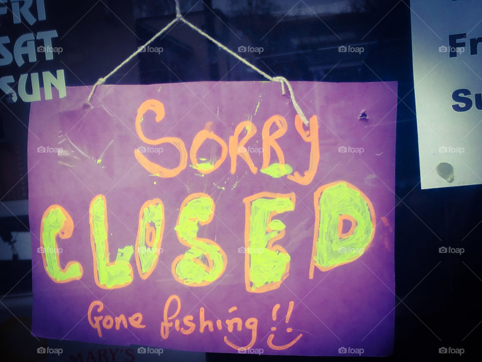 Sorry we are closed. Gone fishing sign