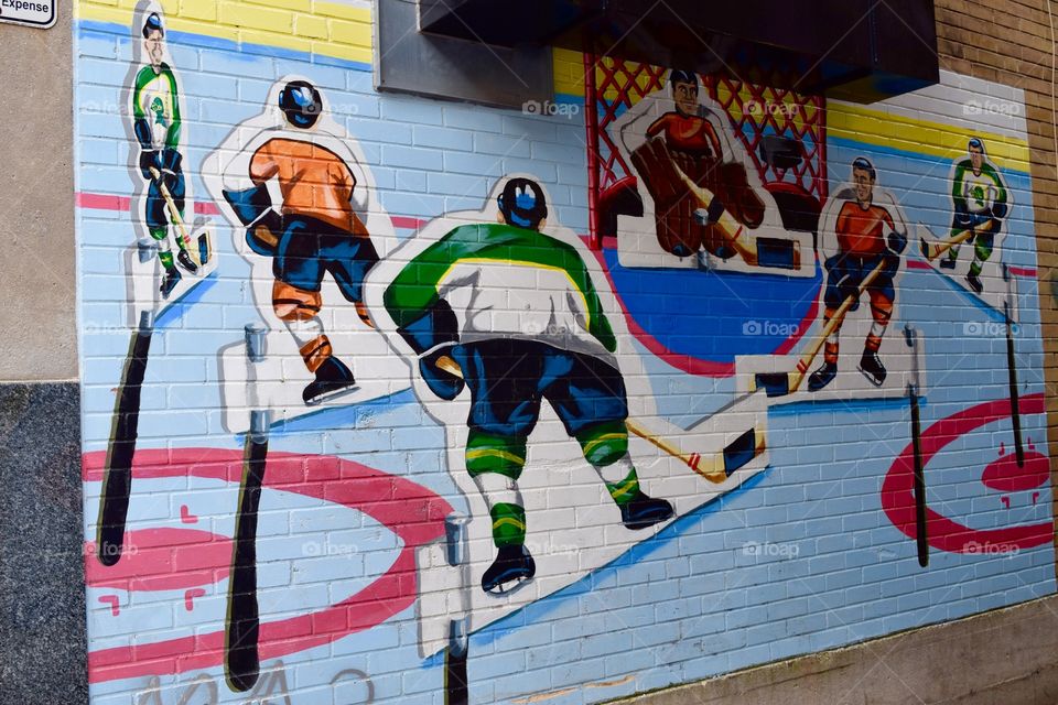 Hockey on brick walls