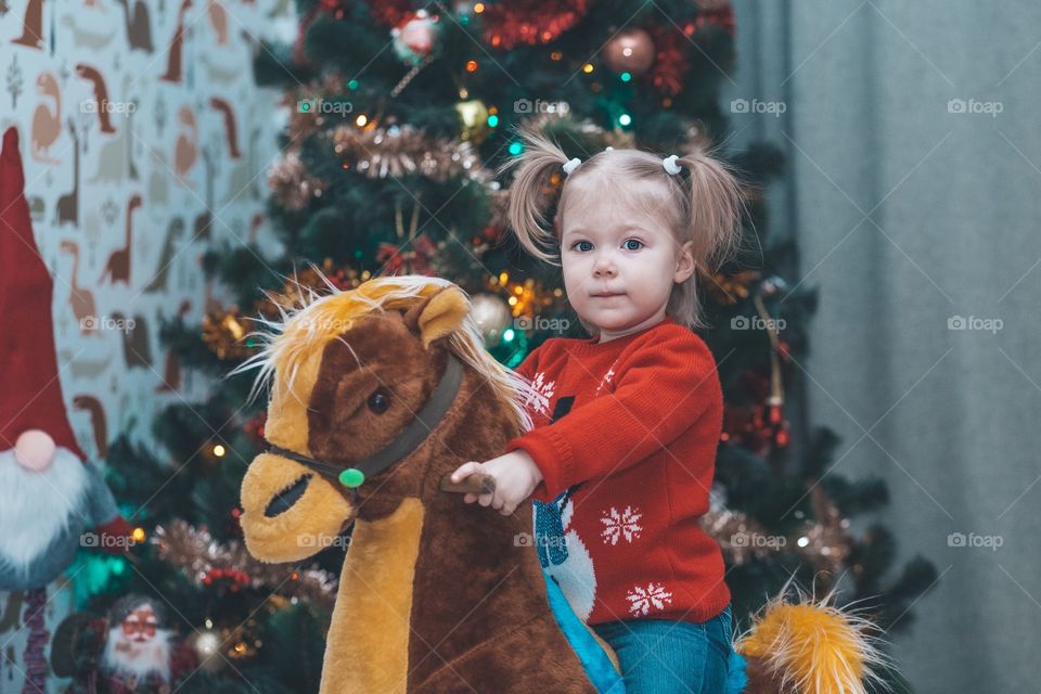 Girl and Christmas decorating 