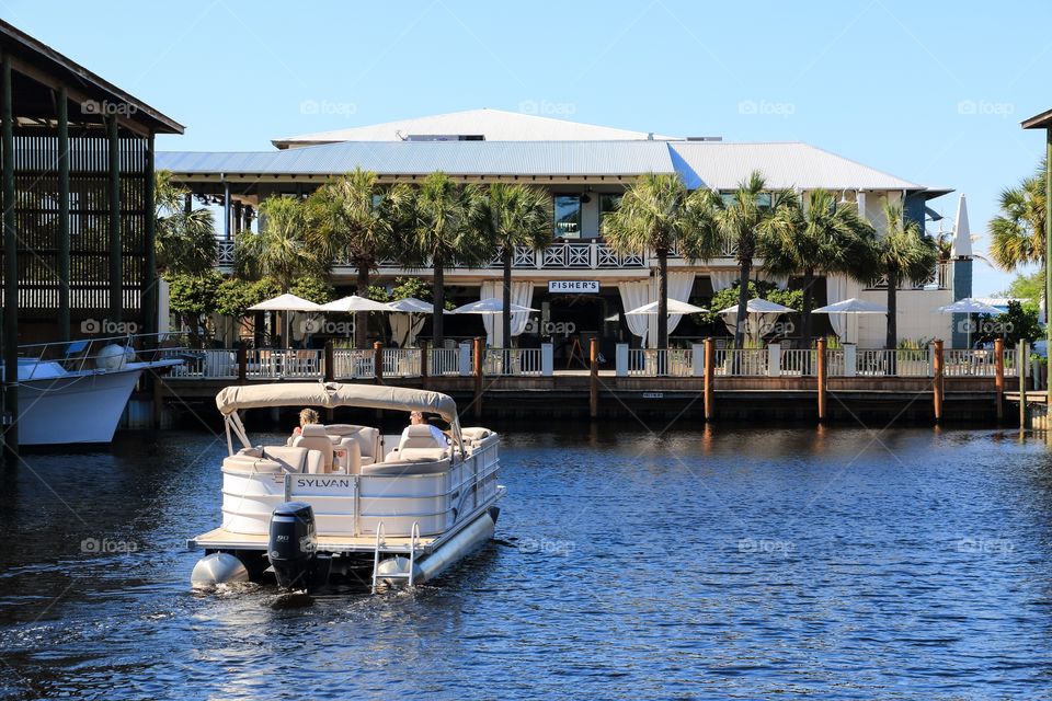 Private boat going to the restaurant 