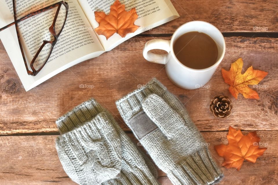 Autumn flat lay, book, gloves, coffee 