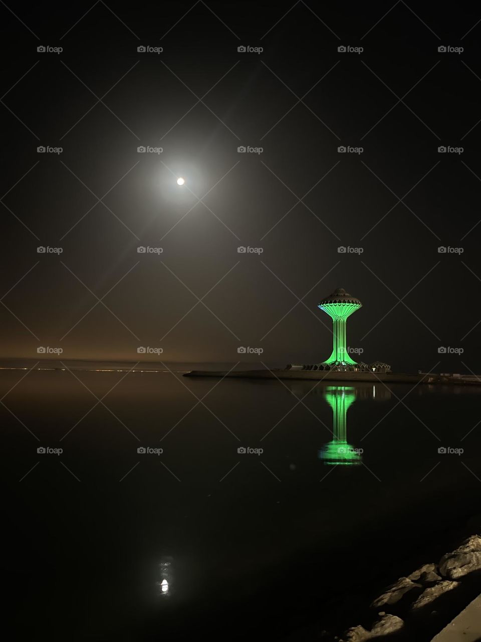 Water Tower from the beach front : The Alkhobar Water Tower is regarded as the city's most iconic feature. The tower is a multi-storey structure on an island surrounded by water that connects the island to the north of the Khobar Corniche…!