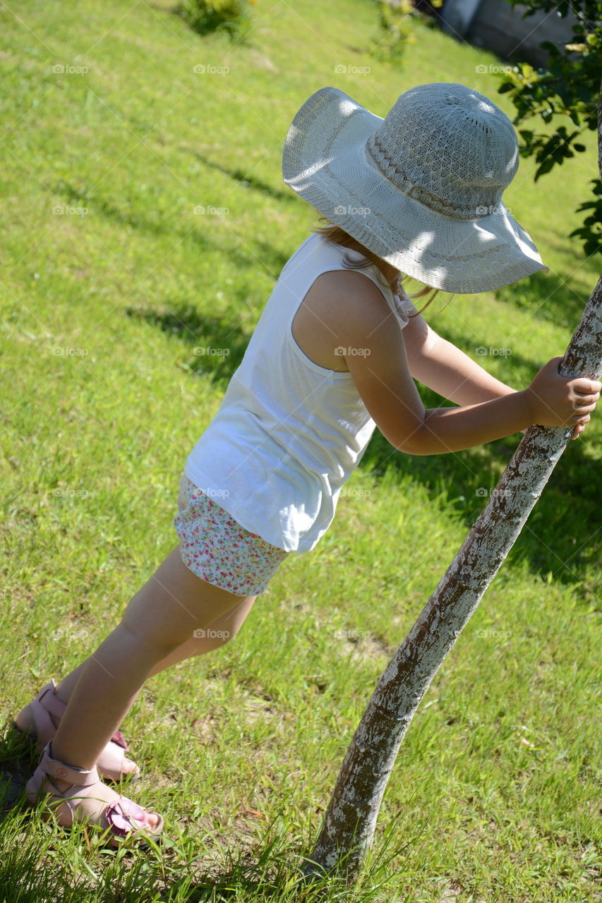 little girl with a hat