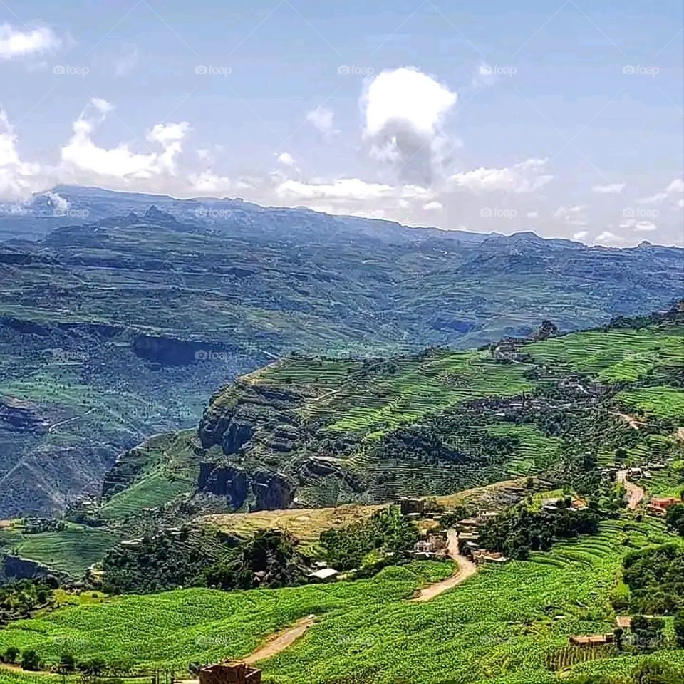 Glory be to God, the magnificent and picturesque view and the natural green trees are a view that is nothing more wonderful than it