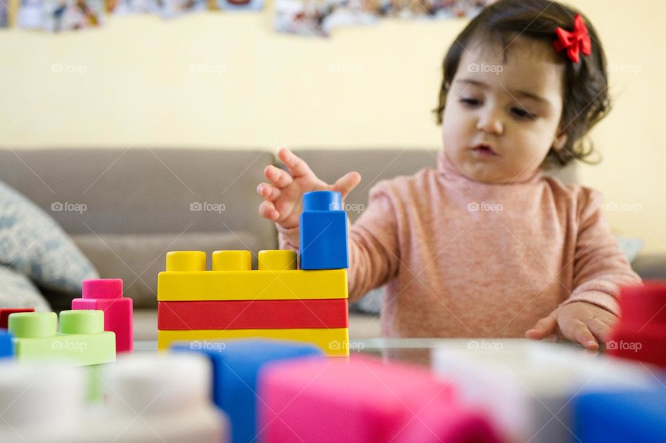 playing with rubber blocks