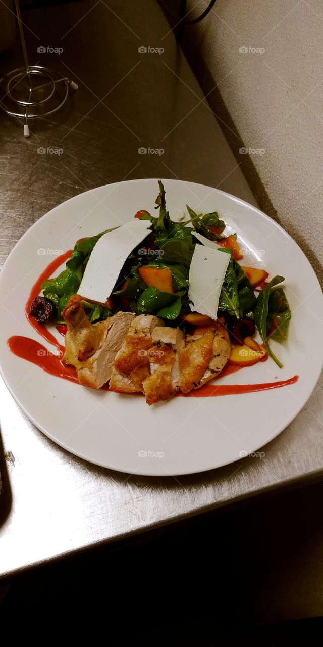 arugala salad with stone fruit sliced ricotta and roast chicken