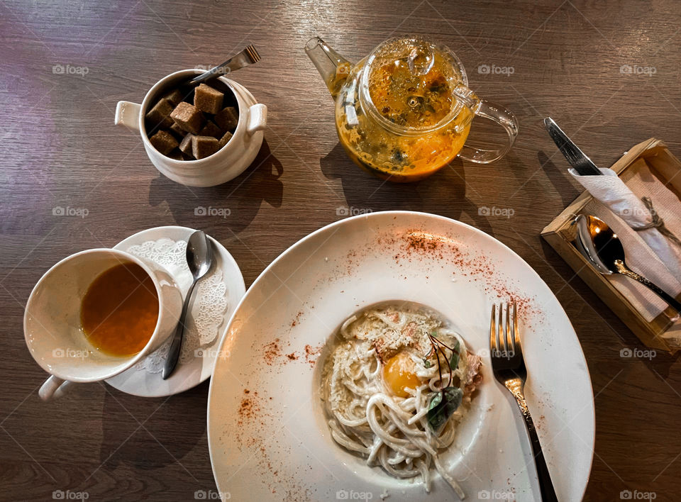 Pasta and buckthorn tea with honey