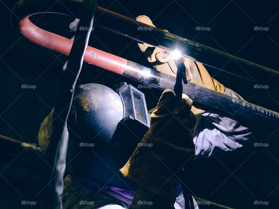 Close-up view of a welder at work