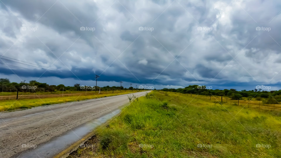 Just after some rain, stopped next to the road to take a photo of the clouds with road from corner