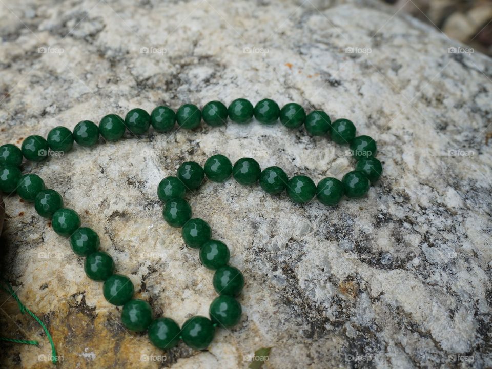 green beads on rock1