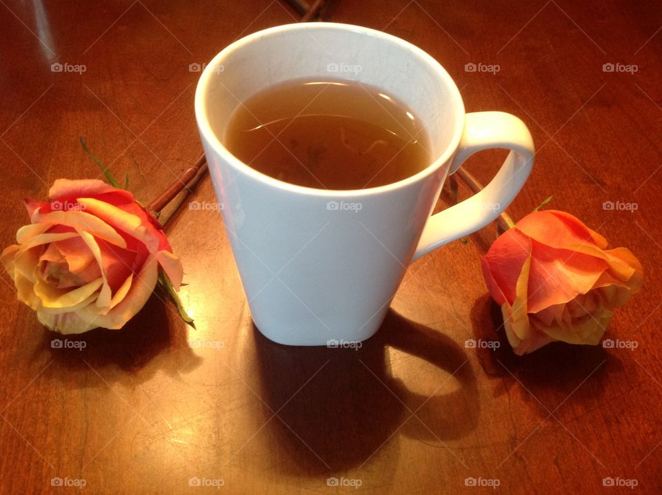 Enjoying a hot cup of tea on a rainy morning. 