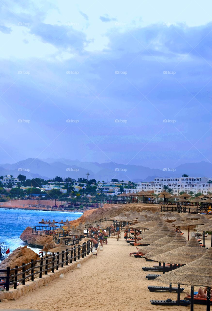 Beach on the Red Sea. Sand mountains and blue sky