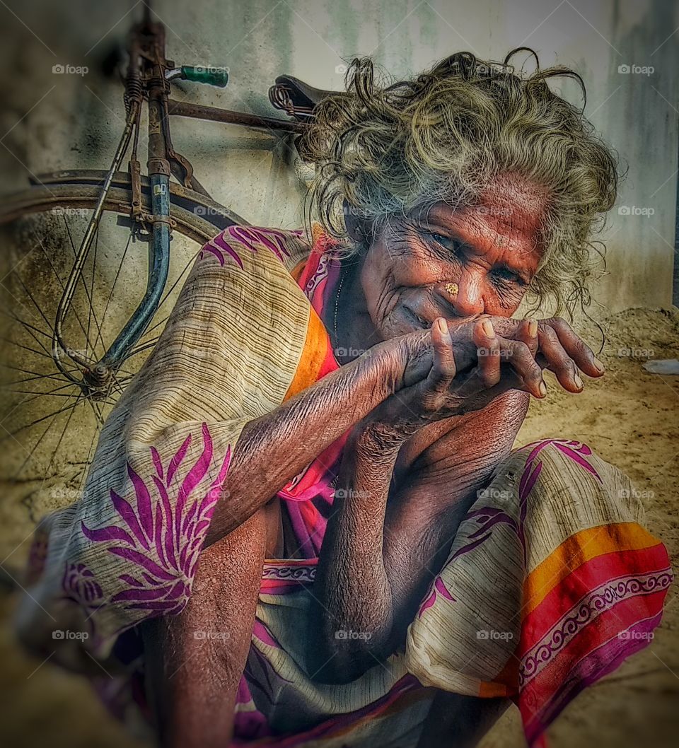 An old lady sitting simple and innocence