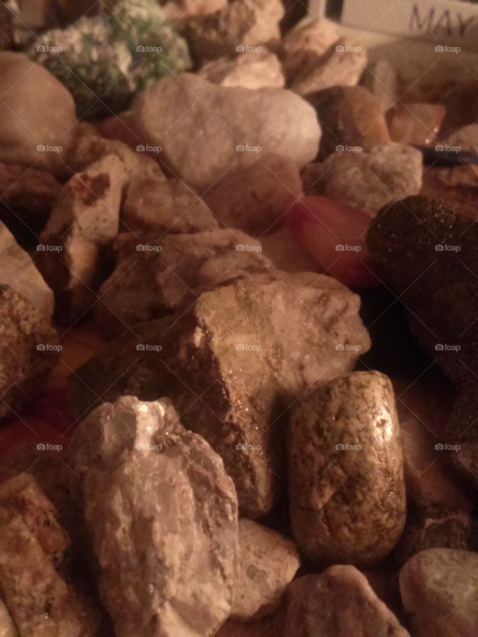 A collection of my Rocks
Which i have collected 
Since i was ten 
I really like Rocks 
Because each one is 
So very different.
There are big ones 
There are small ones
Different Colors , in each one.
Designs and faces 
Animals, hearts, individual 
Artistic lines . 
This is why i collect rocks
I can put them in my room
They don' t wither and die 
They are neat to look at
And i enjoy looking  on  
God's Artistic  Cool Creation