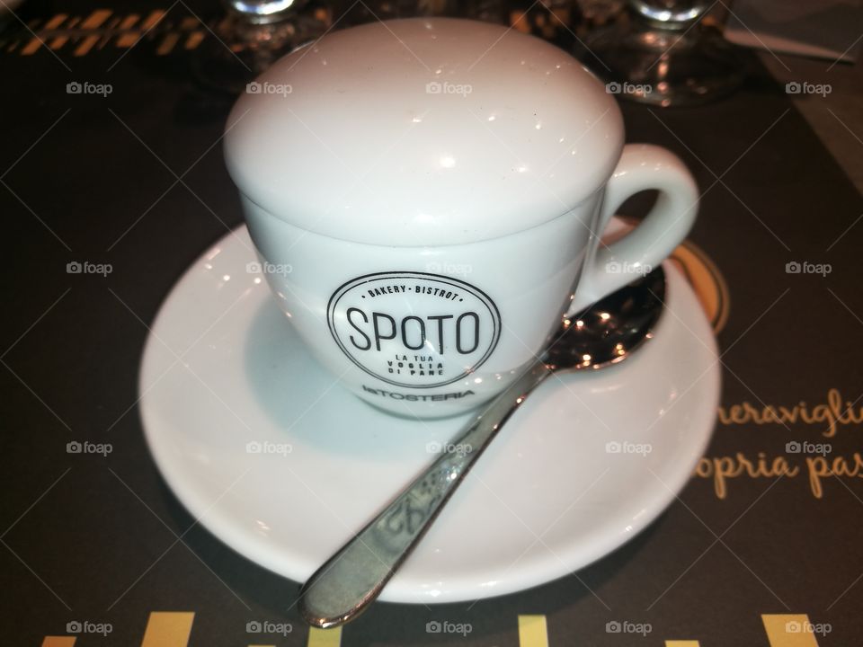 covered espresso cup, a hot espresso whenever