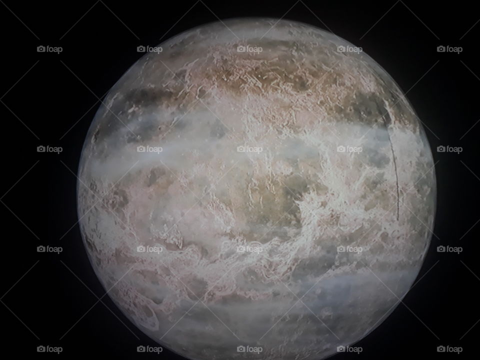 a beautiful Divine nature showing its moon in the darkness of the immensity of the universe