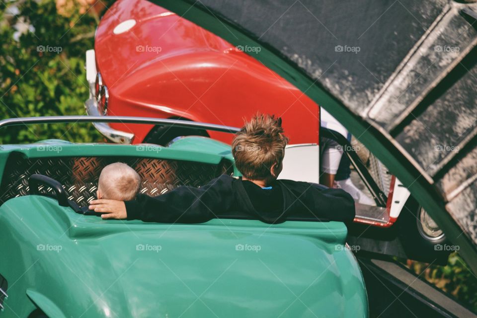 Children riding an amusement ride