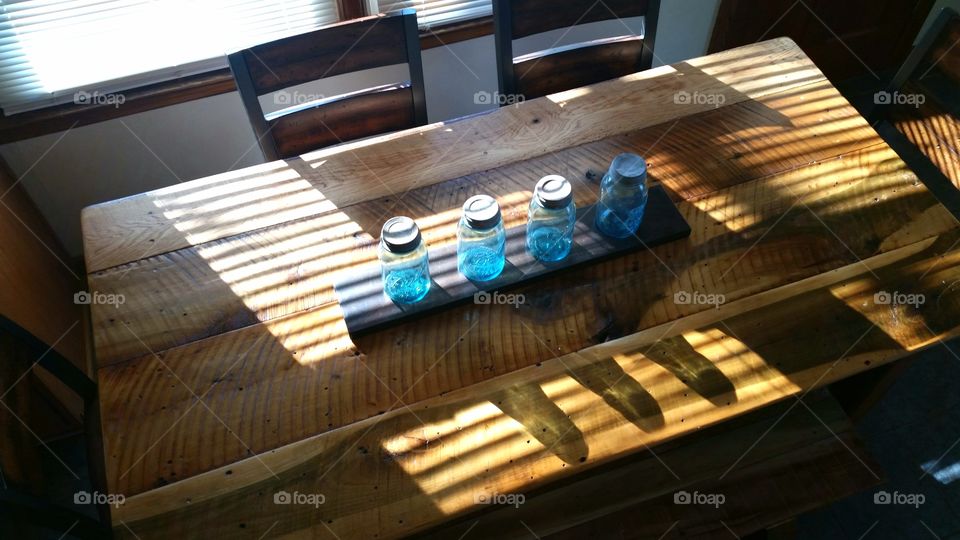 Mason jars on a farm table