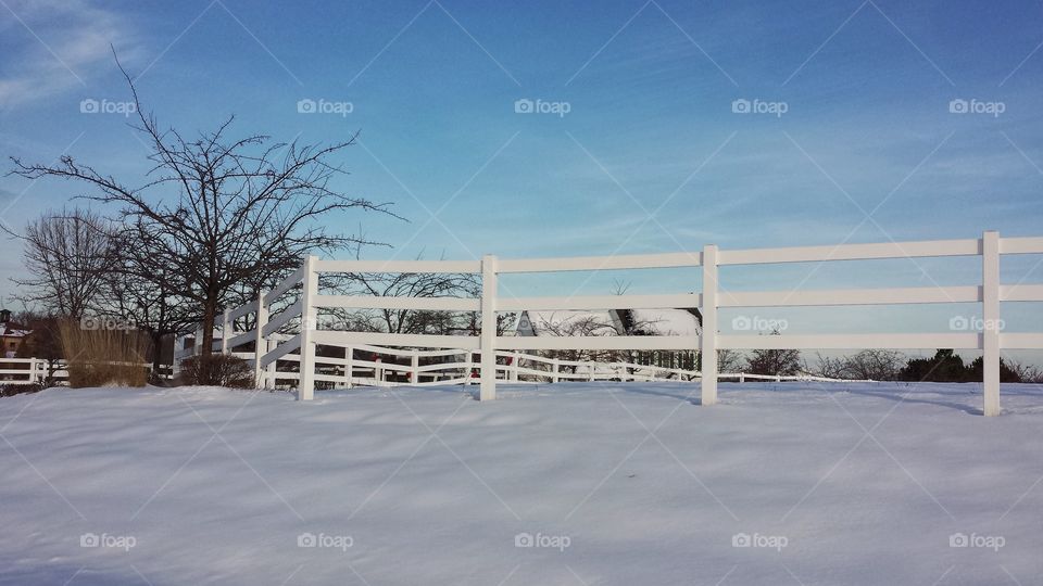 Snow land against blue sky