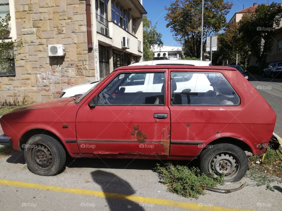 Autumn Is coming car slowly rusting on the street
