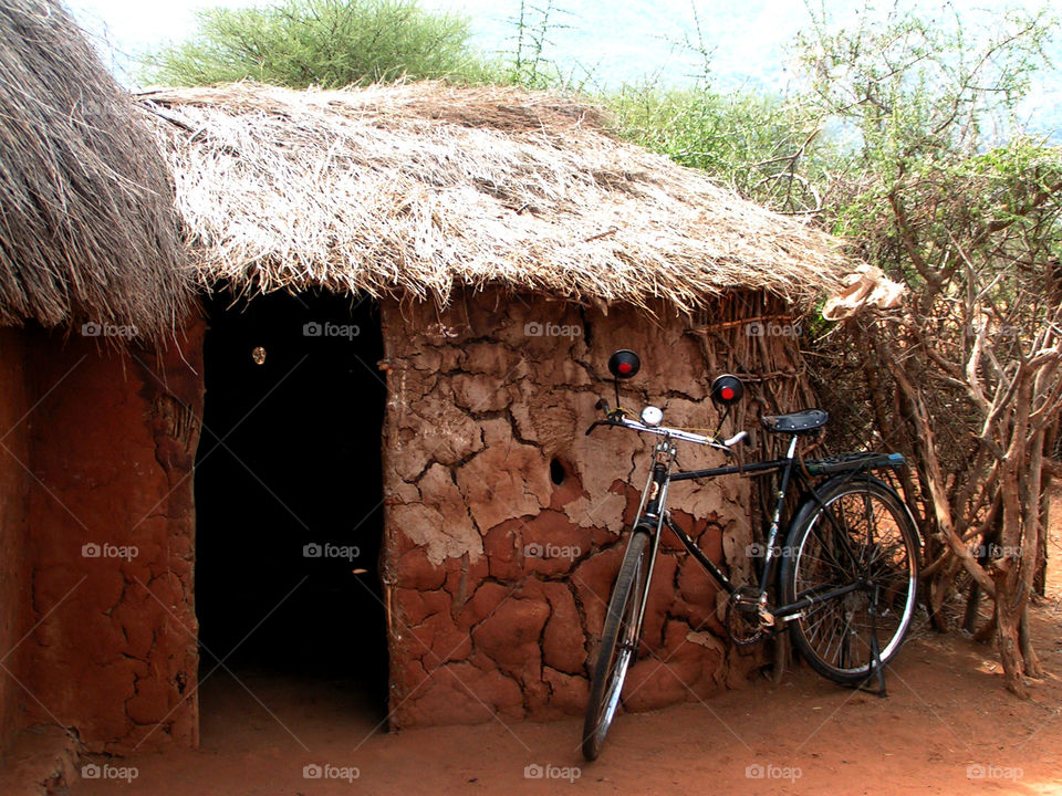 Maasai home with bicycle