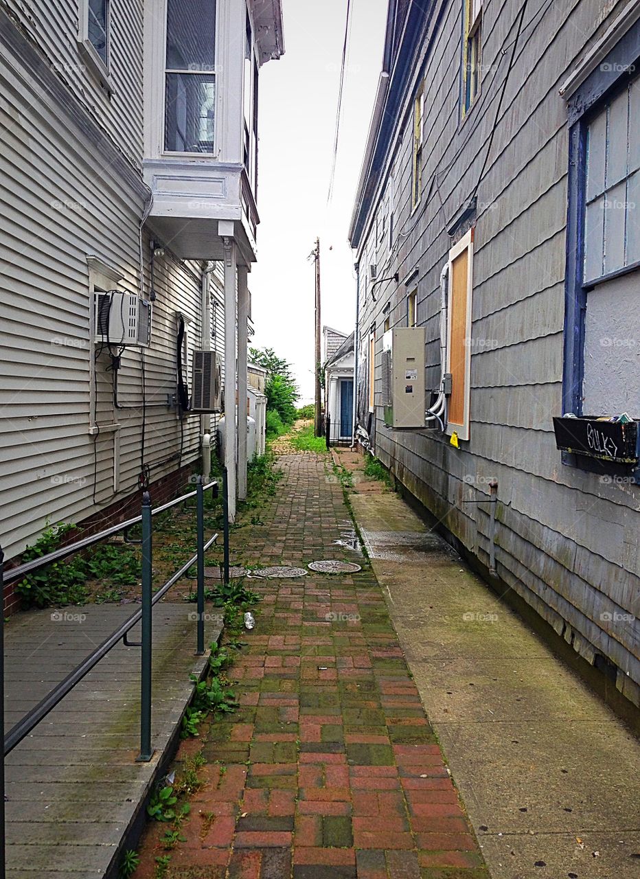 Brick alley to the beach in Provincetown, Cape Cod, Massachusetts 