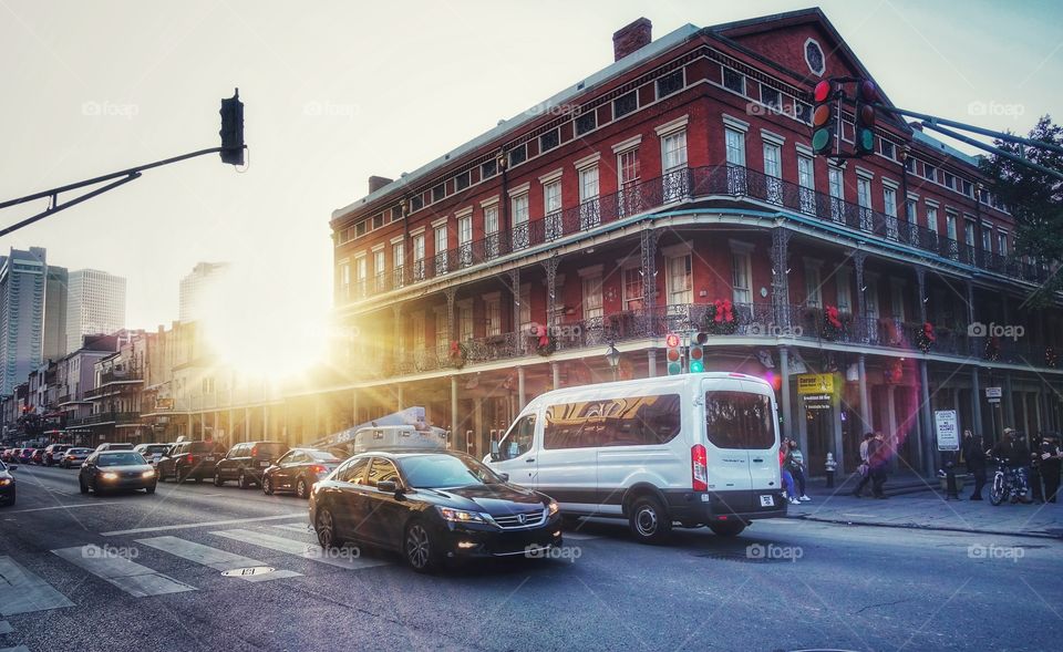 Busy street at the French Quarter. Image features some buildings with vintage designs. New Orleans, Louisiana, USA.