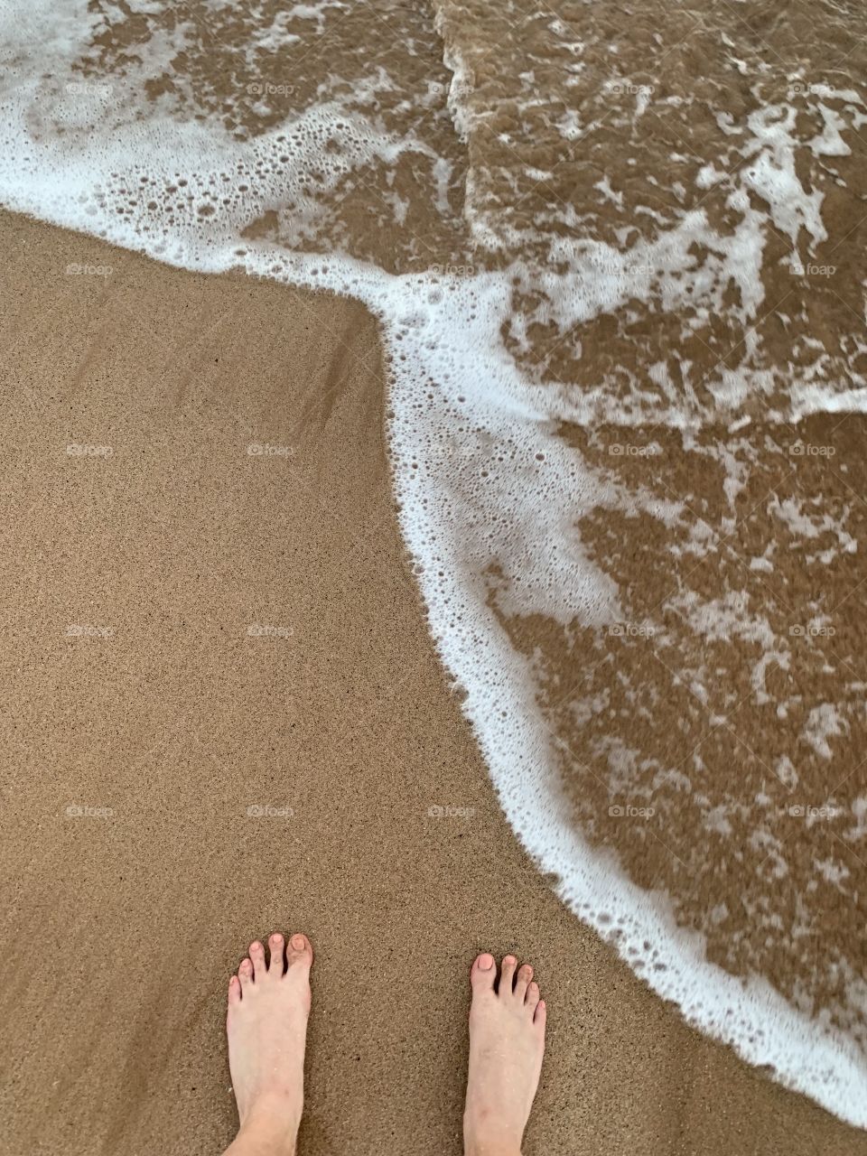 Toes on the sand