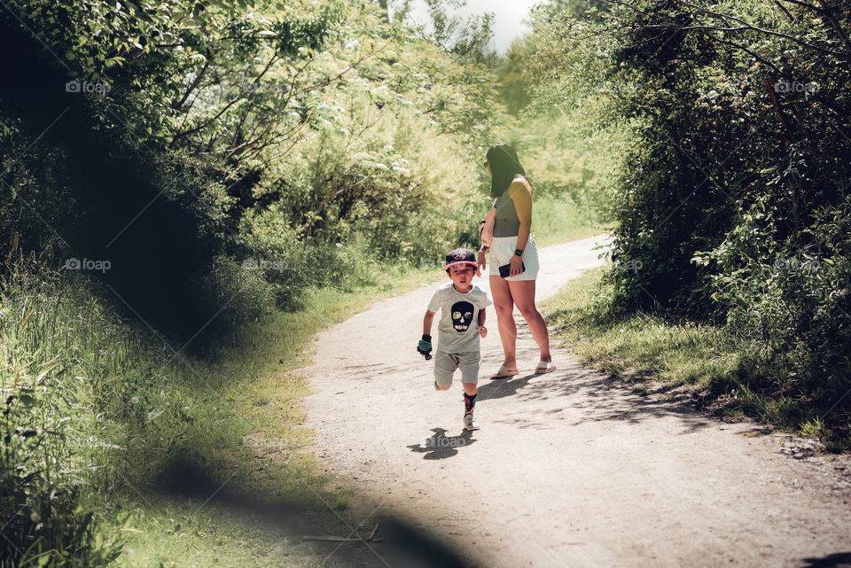 boy running at the park