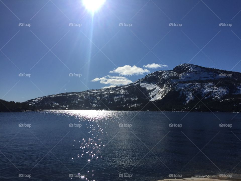 Beautiful Norway. A beautiful lake in between mountains covered in snow. Amazing 