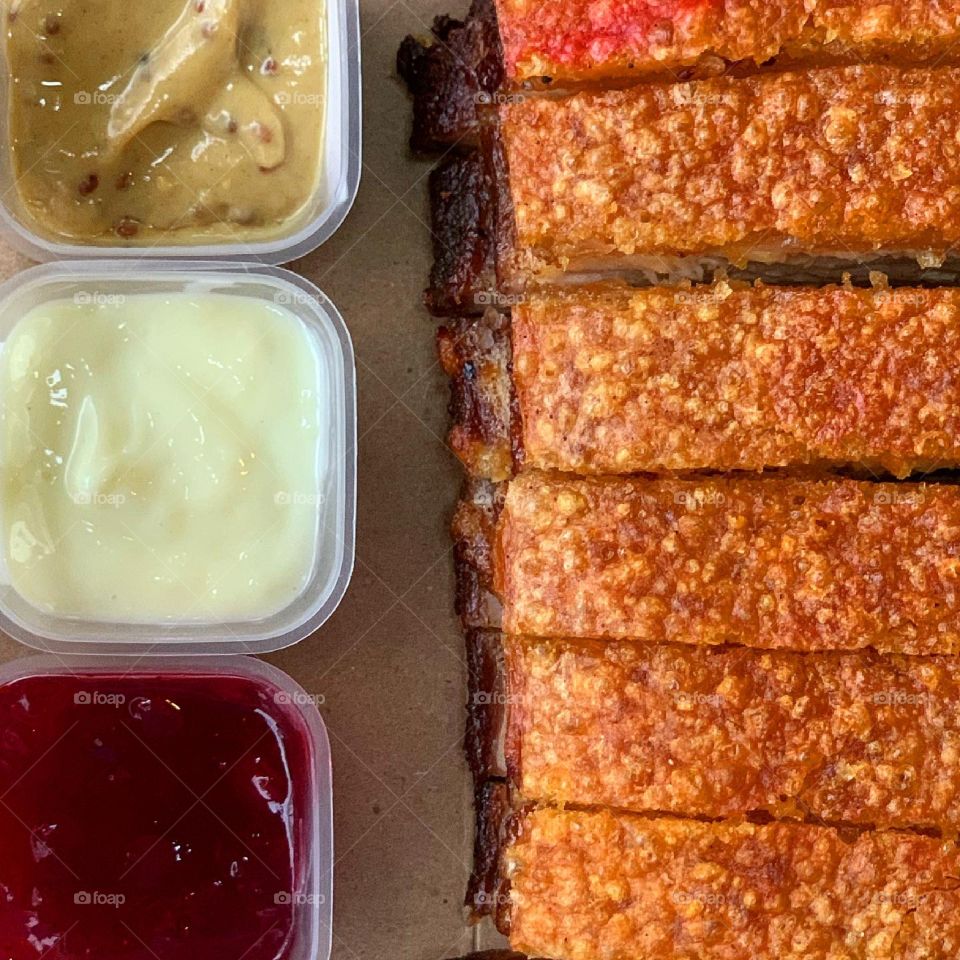 Roasted pork belly with 3 sauces: lingonberry jam, honey mustard and wasabi mayo 