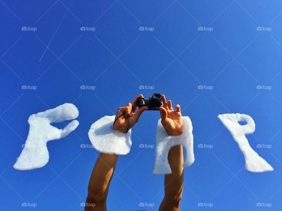 A foaper in action. A foaper in action above into the Sky where the clouds look like a Foap sign