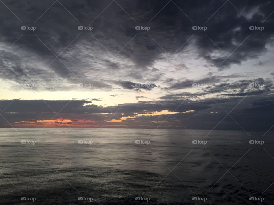 Dark clouds above ocean 