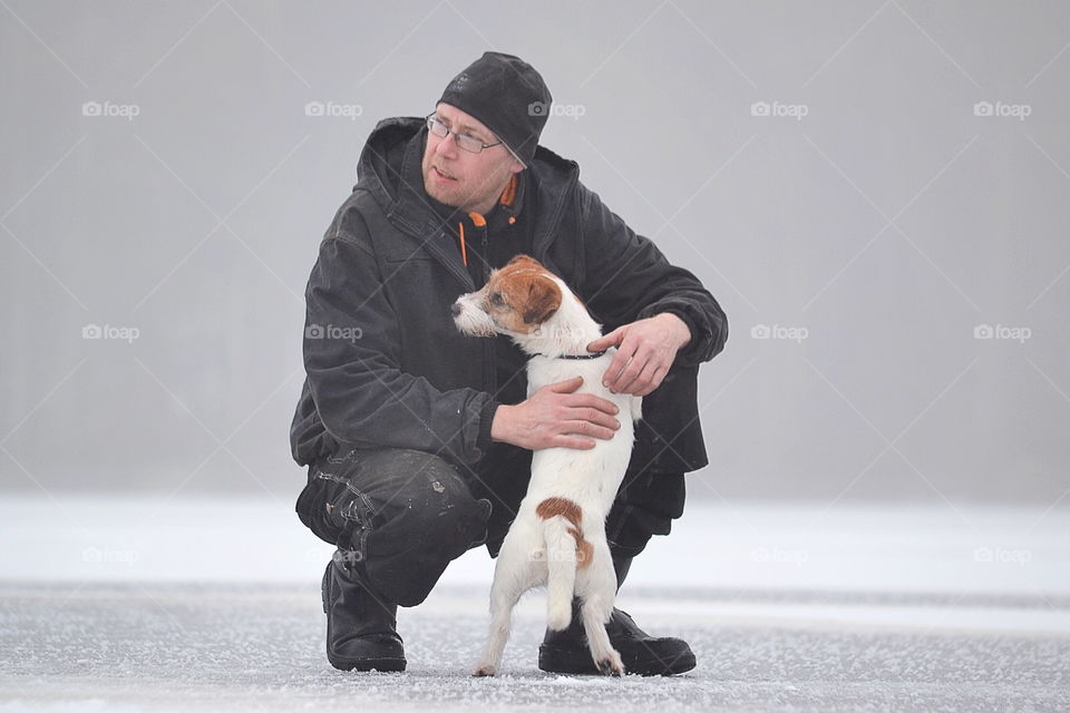 Man with hos dog