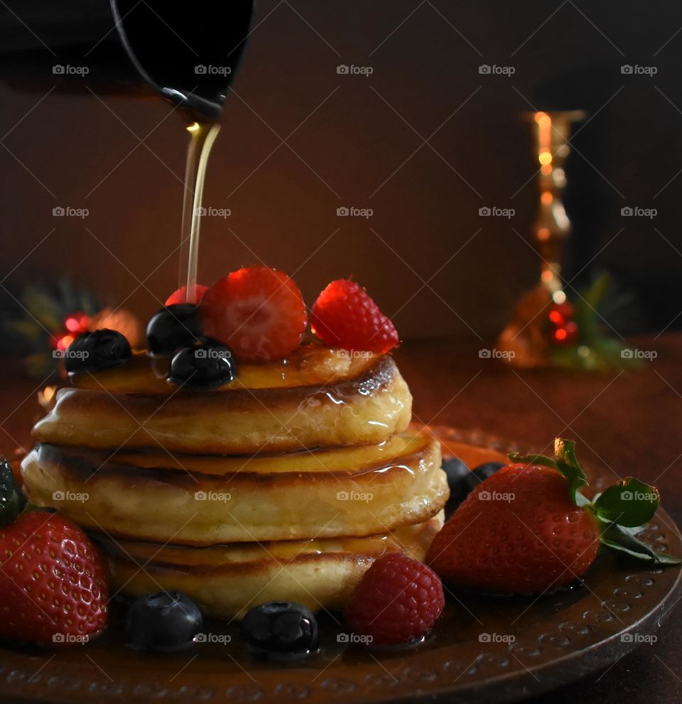 Fresh pancakes with berries on top 