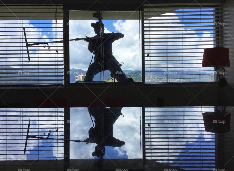 Window washer working on a high-rise building