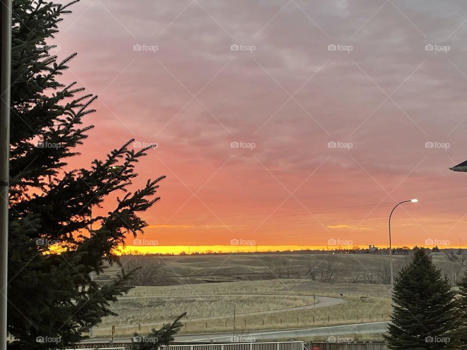 Finally up to get a picture of the sunrise, as it comes up over the prairies, and was blessed with this beauty, on a cloudy morning with my iPhone 12