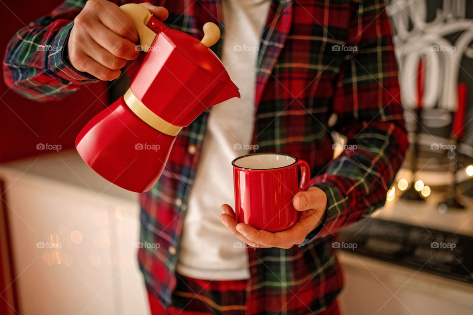 cup of coffee in a cozy festive Christmas atmosphere