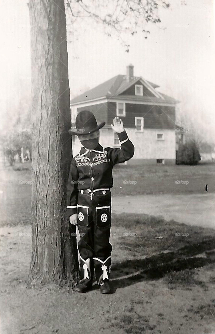 Young boy dressed as Hopalong Cassidy 1953