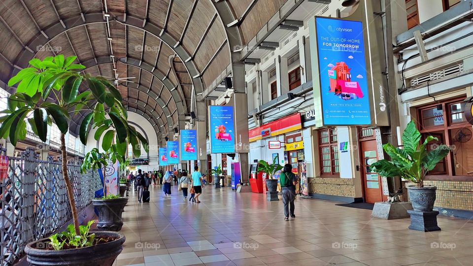 One of the interior corners of the Jakarta Kota station with an electronic billboard