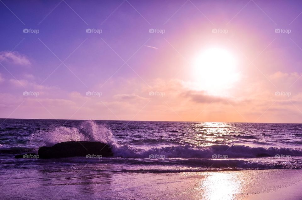 Wave crashing on rock